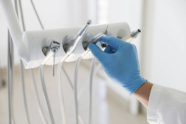 Professional Emergency Dentist technician working in East Norwich, NY